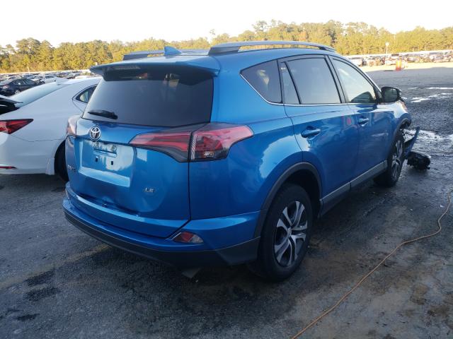 Photo 3 VIN: JTMZFREV1HJ701103 - TOYOTA RAV4 LE 