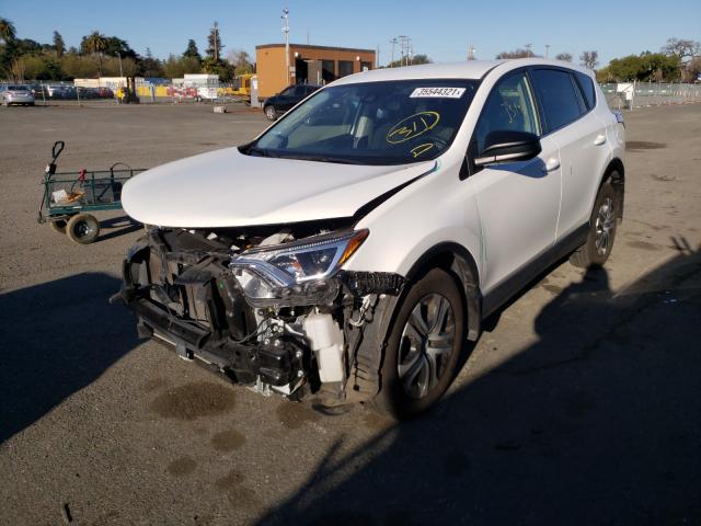 Photo 1 VIN: JTMZFREV1JD115442 - TOYOTA RAV4 LE 