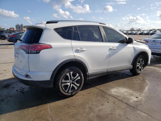 Photo 2 VIN: JTMZFREV1JD129664 - TOYOTA RAV4 LE 