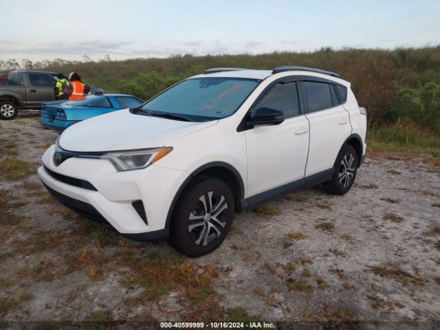 Photo 1 VIN: JTMZFREV1JJ163377 - TOYOTA RAV4 