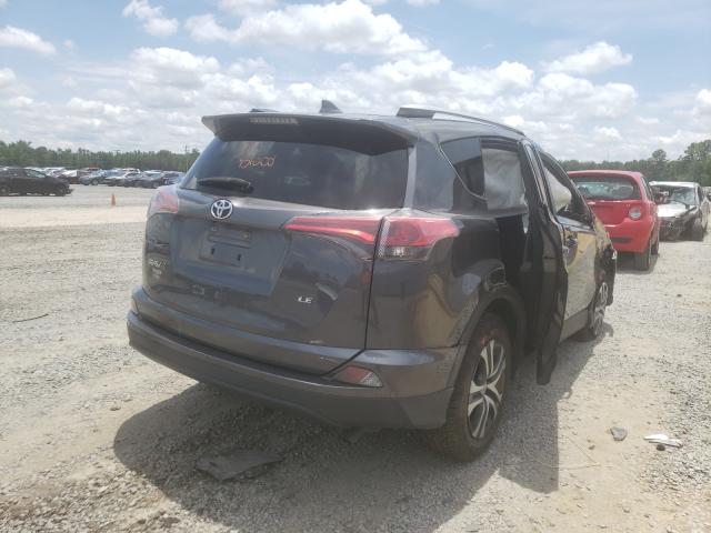 Photo 3 VIN: JTMZFREV2GD082721 - TOYOTA RAV4 LE 