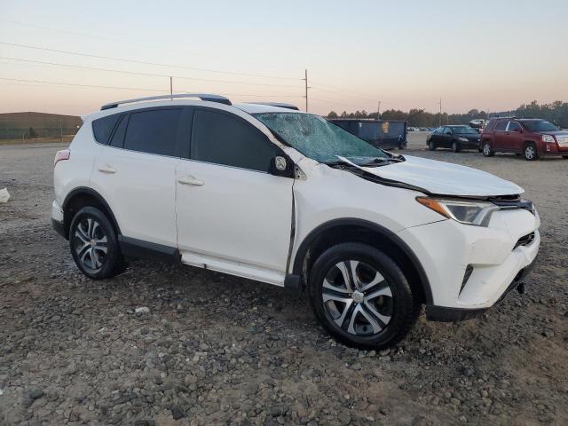 Photo 3 VIN: JTMZFREV2GD088423 - TOYOTA RAV4 LE 