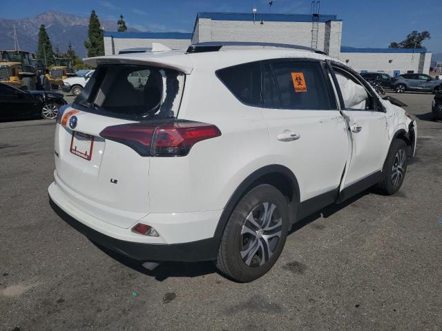 Photo 3 VIN: JTMZFREV2GJ095681 - TOYOTA RAV4 LE 