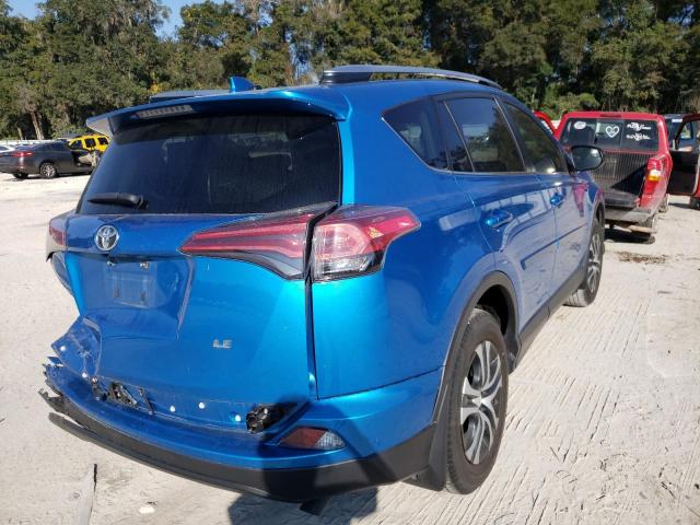 Photo 3 VIN: JTMZFREV2JD130628 - TOYOTA RAV4 LE 