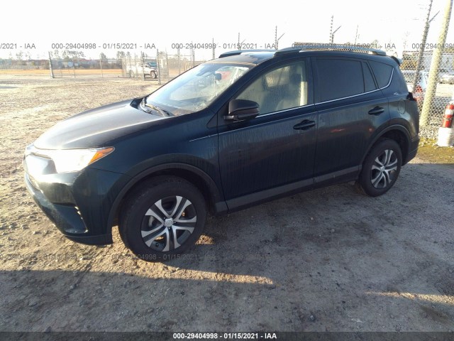 Photo 1 VIN: JTMZFREV2JJ165915 - TOYOTA RAV4 