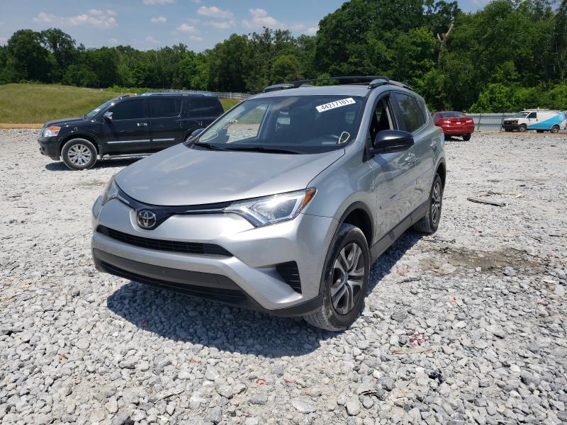 Photo 1 VIN: JTMZFREV2JJ174999 - TOYOTA RAV4 LE 