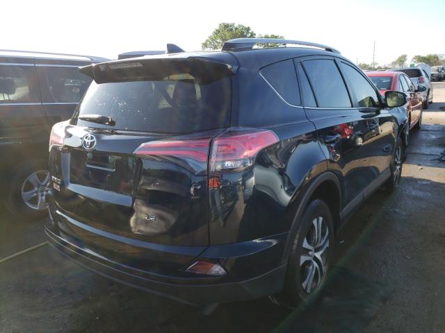 Photo 3 VIN: JTMZFREV2JJ186571 - TOYOTA RAV4 LE 