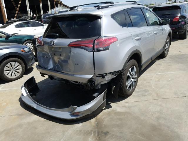 Photo 3 VIN: JTMZFREV2JJ212635 - TOYOTA RAV4 LE 