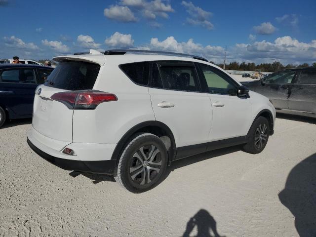 Photo 2 VIN: JTMZFREV3GJ067436 - TOYOTA RAV4 LE 