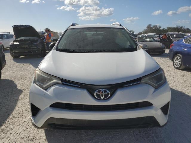 Photo 4 VIN: JTMZFREV3GJ067436 - TOYOTA RAV4 LE 