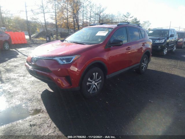 Photo 1 VIN: JTMZFREV3GJ082325 - TOYOTA RAV4 