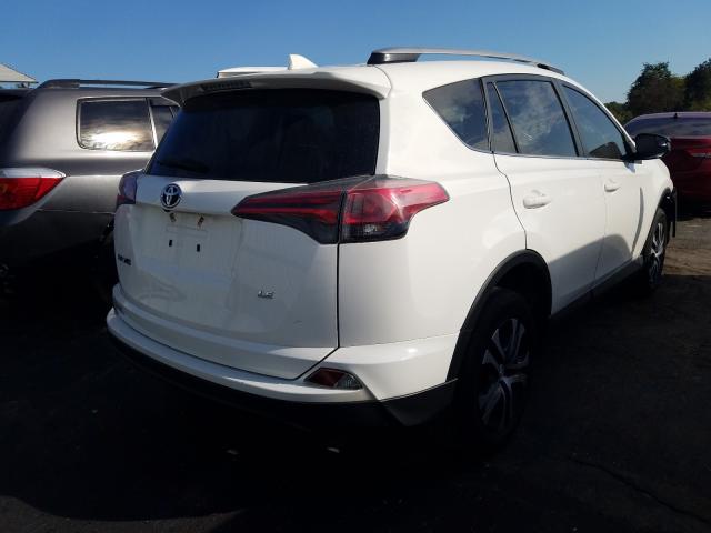 Photo 3 VIN: JTMZFREV3HJ700809 - TOYOTA RAV4 LE 