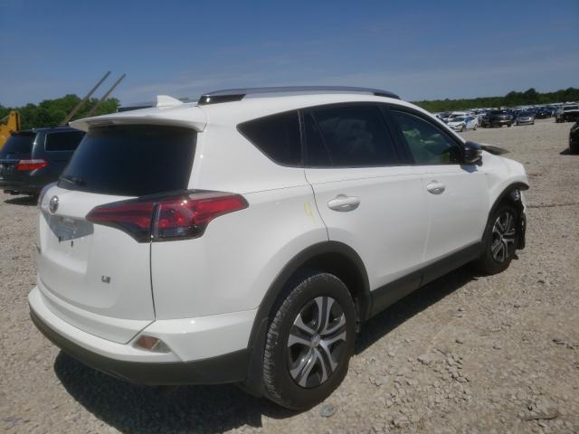 Photo 3 VIN: JTMZFREV3JJ156771 - TOYOTA RAV4 LE 