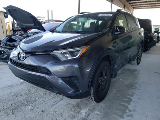 Photo 1 VIN: JTMZFREV4GJ099392 - TOYOTA RAV4 LE 