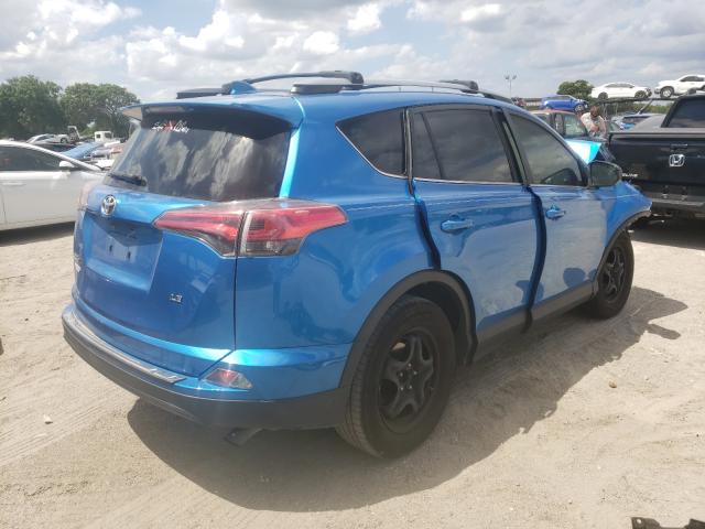 Photo 3 VIN: JTMZFREV5JJ165083 - TOYOTA RAV4 LE 