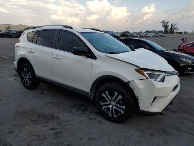 Photo 3 VIN: JTMZFREV5JJ176519 - TOYOTA RAV4 LE 