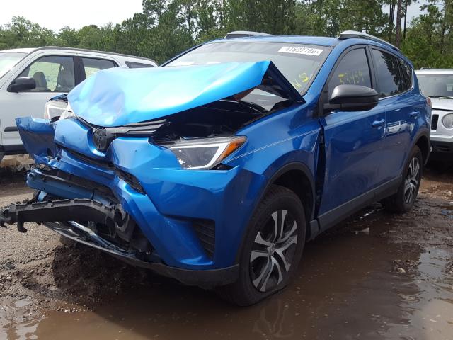 Photo 1 VIN: JTMZFREV6GJ090628 - TOYOTA RAV4 LE 