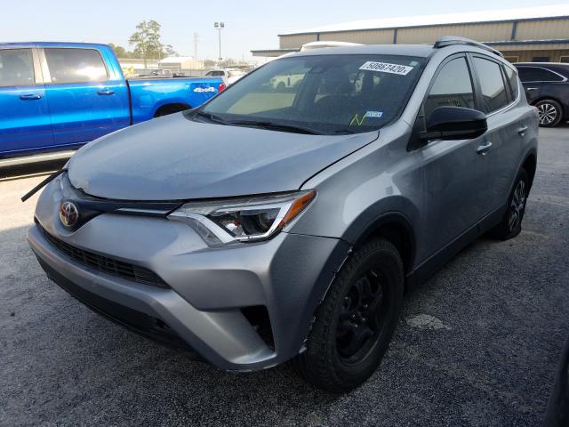 Photo 1 VIN: JTMZFREV6JJ163827 - TOYOTA RAV4 LE 