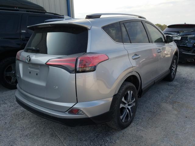 Photo 3 VIN: JTMZFREV6JJ163827 - TOYOTA RAV4 LE 