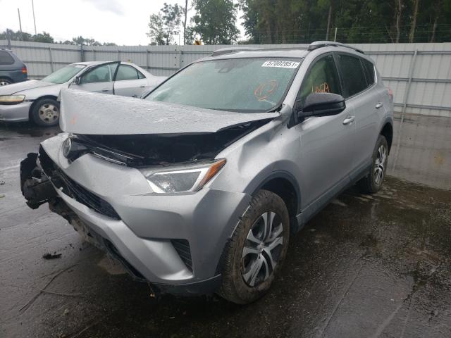 Photo 1 VIN: JTMZFREV6JJ165903 - TOYOTA RAV4 LE 