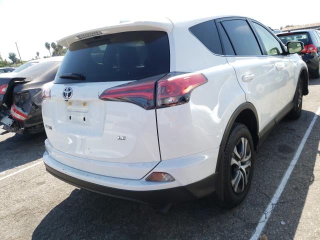 Photo 3 VIN: JTMZFREV6JJ750416 - TOYOTA RAV4 LE 