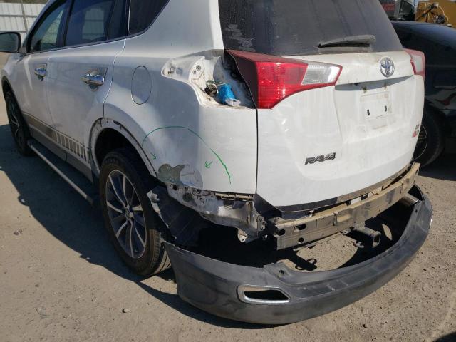 Photo 8 VIN: JTMZFREV7ED035116 - TOYOTA RAV4 LE 