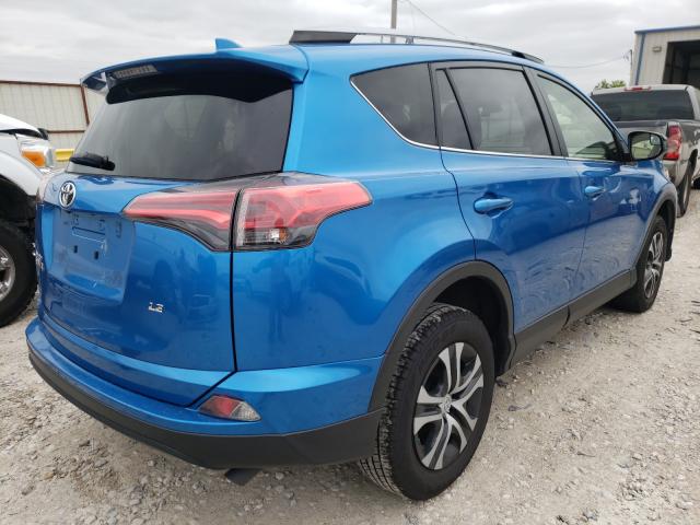 Photo 3 VIN: JTMZFREV7JJ156921 - TOYOTA RAV4 LE 