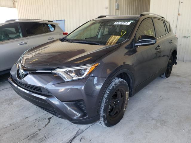 Photo 1 VIN: JTMZFREV7JJ160676 - TOYOTA RAV4 LE 