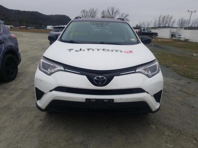 Photo 4 VIN: JTMZFREV7JJ211142 - TOYOTA RAV4 LE 