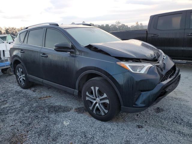 Photo 3 VIN: JTMZFREV7JJ734662 - TOYOTA RAV4 LE 