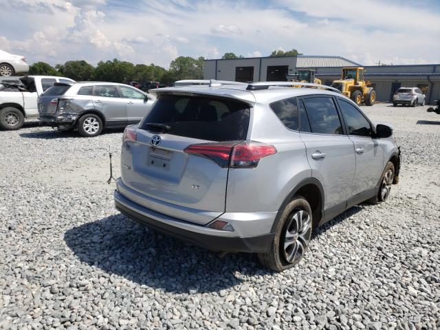 Photo 3 VIN: JTMZFREV8JJ173601 - TOYOTA RAV4 LE 