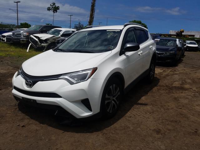 Photo 1 VIN: JTMZFREV9GD091285 - TOYOTA RAV4 LE 