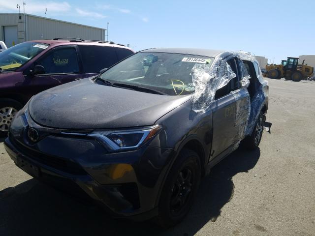 Photo 1 VIN: JTMZFREV9JJ209196 - TOYOTA RAV4 LE 