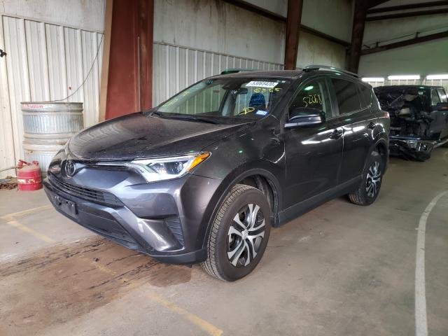 Photo 1 VIN: JTMZFREV9JJ726885 - TOYOTA RAV4 LE 