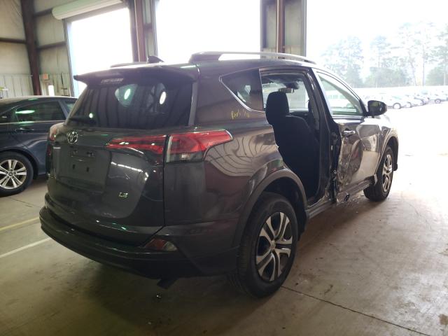 Photo 3 VIN: JTMZFREV9JJ726885 - TOYOTA RAV4 LE 