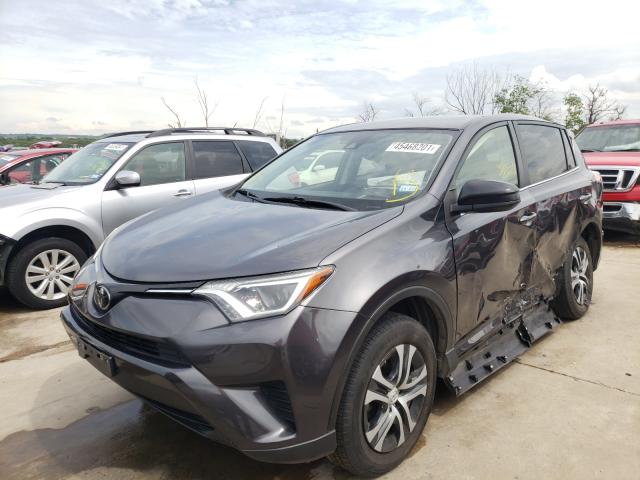 Photo 1 VIN: JTMZFREV9JJ740835 - TOYOTA RAV4 LE 