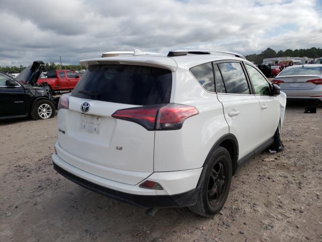 Photo 3 VIN: JTMZFREVXGD086371 - TOYOTA RAV4 LE 