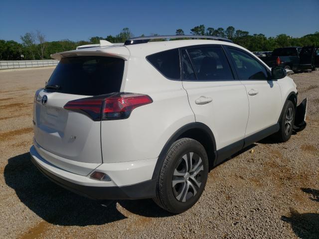 Photo 3 VIN: JTMZFREVXJJ169520 - TOYOTA RAV4 LE 