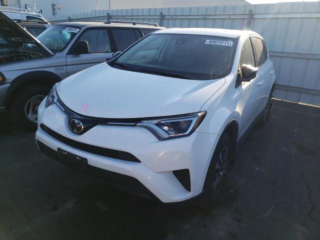 Photo 1 VIN: JTMZFREVXJJ725549 - TOYOTA RAV4 LE 