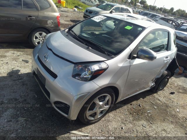 Photo 1 VIN: JTNJJXB02EJ028063 - SCION IQ 