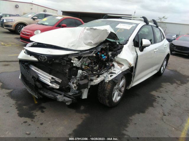 Photo 5 VIN: JTNK4RBE4K3057213 - TOYOTA COROLLA HATCHBACK 