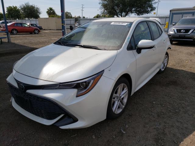 Photo 1 VIN: JTNK4RBE9K3030010 - TOYOTA COROLLA SE 