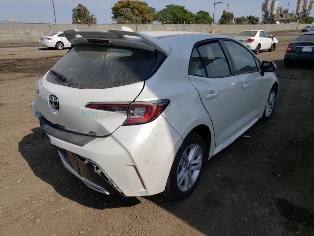 Photo 3 VIN: JTNK4RBE9K3030010 - TOYOTA COROLLA SE 