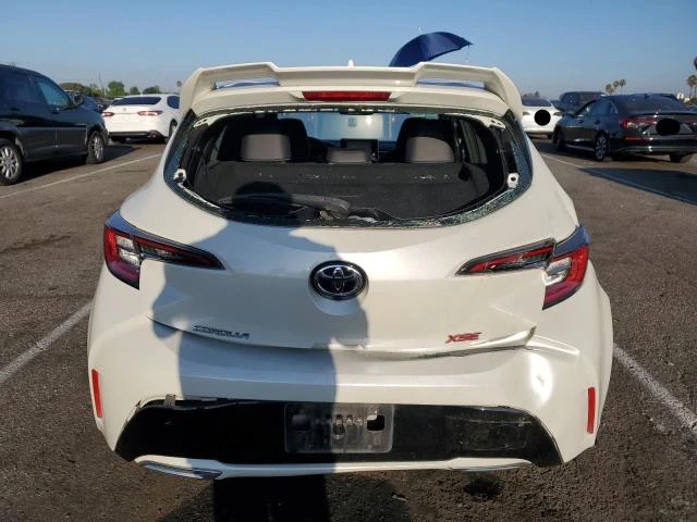 Photo 5 VIN: JTNK4RBE9K3031089 - TOYOTA COROLLA SE 