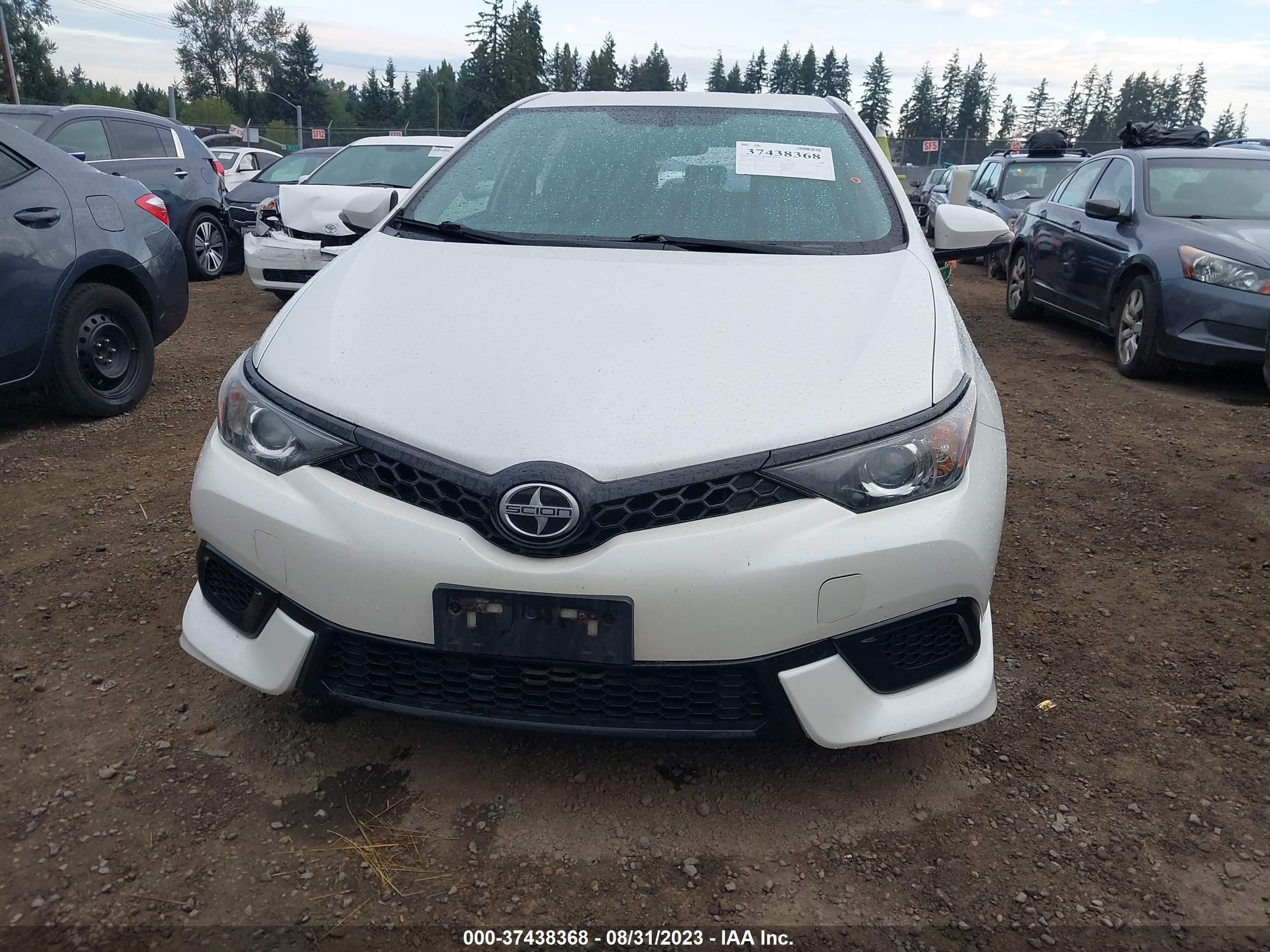 Photo 11 VIN: JTNKARJE2GJ507552 - SCION IM 