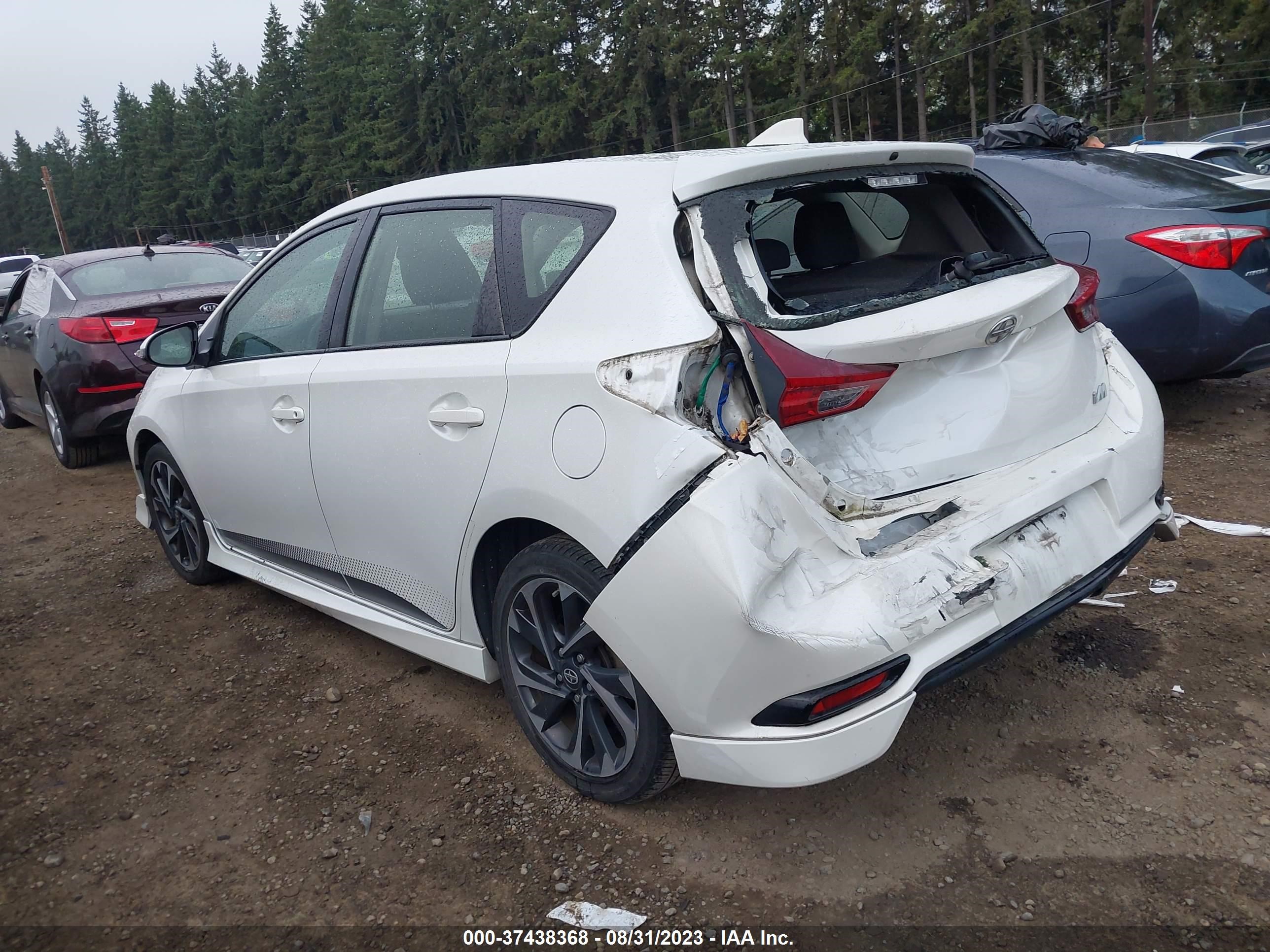 Photo 2 VIN: JTNKARJE2GJ507552 - SCION IM 