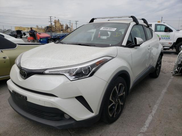 Photo 1 VIN: JTNKHMBX1J1010787 - TOYOTA C-HR XLE 