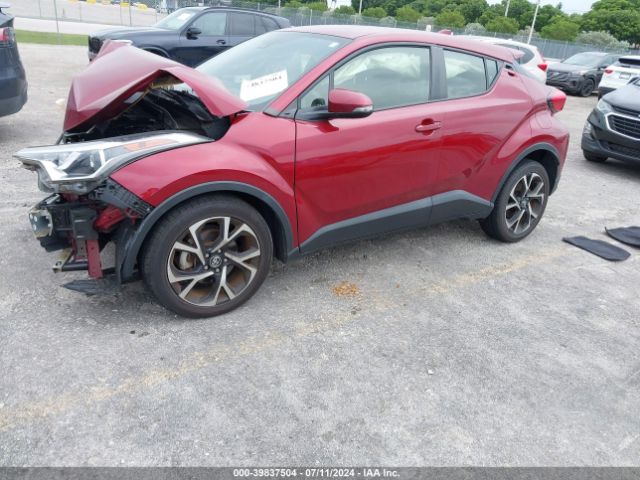 Photo 1 VIN: JTNKHMBX1K1016557 - TOYOTA C-HR 