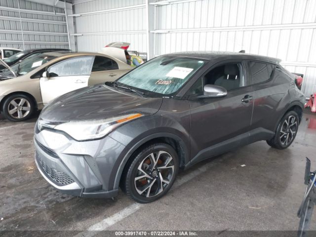 Photo 1 VIN: JTNKHMBX2M1100275 - TOYOTA C-HR 