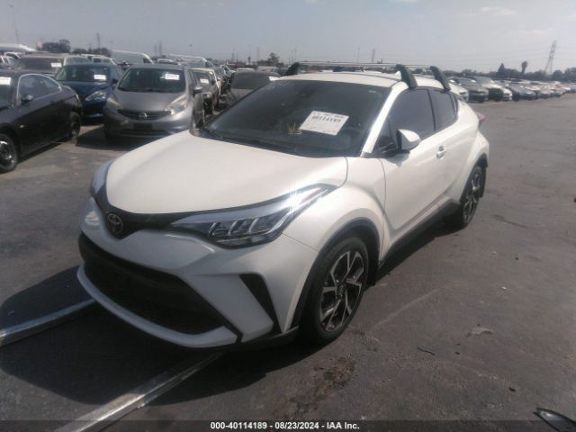 Photo 1 VIN: JTNKHMBX4L1085941 - TOYOTA C-HR 